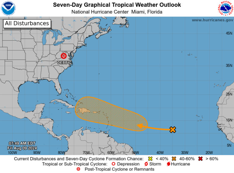 Map showing a tropical weather outlook with a highlighted area in the Atlantic, indicating potential cyclone formation over the next seven days, approaching the Caribbean.