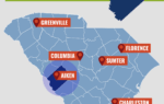 Map of South Carolina highlighting Aiken County, with major cities labeled: Greenville, Columbia, Florence, Sumter, Charleston, Hilton Head. Banner reads "Expansion Aiken County."