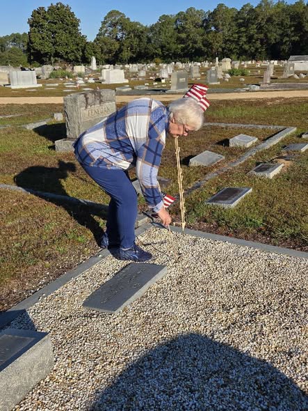 Placing flags on Veterans' grave sites at Riverside Cemetery in Dillon. (Photos by Johnnie Daniels/The Dillon County News, LLC)