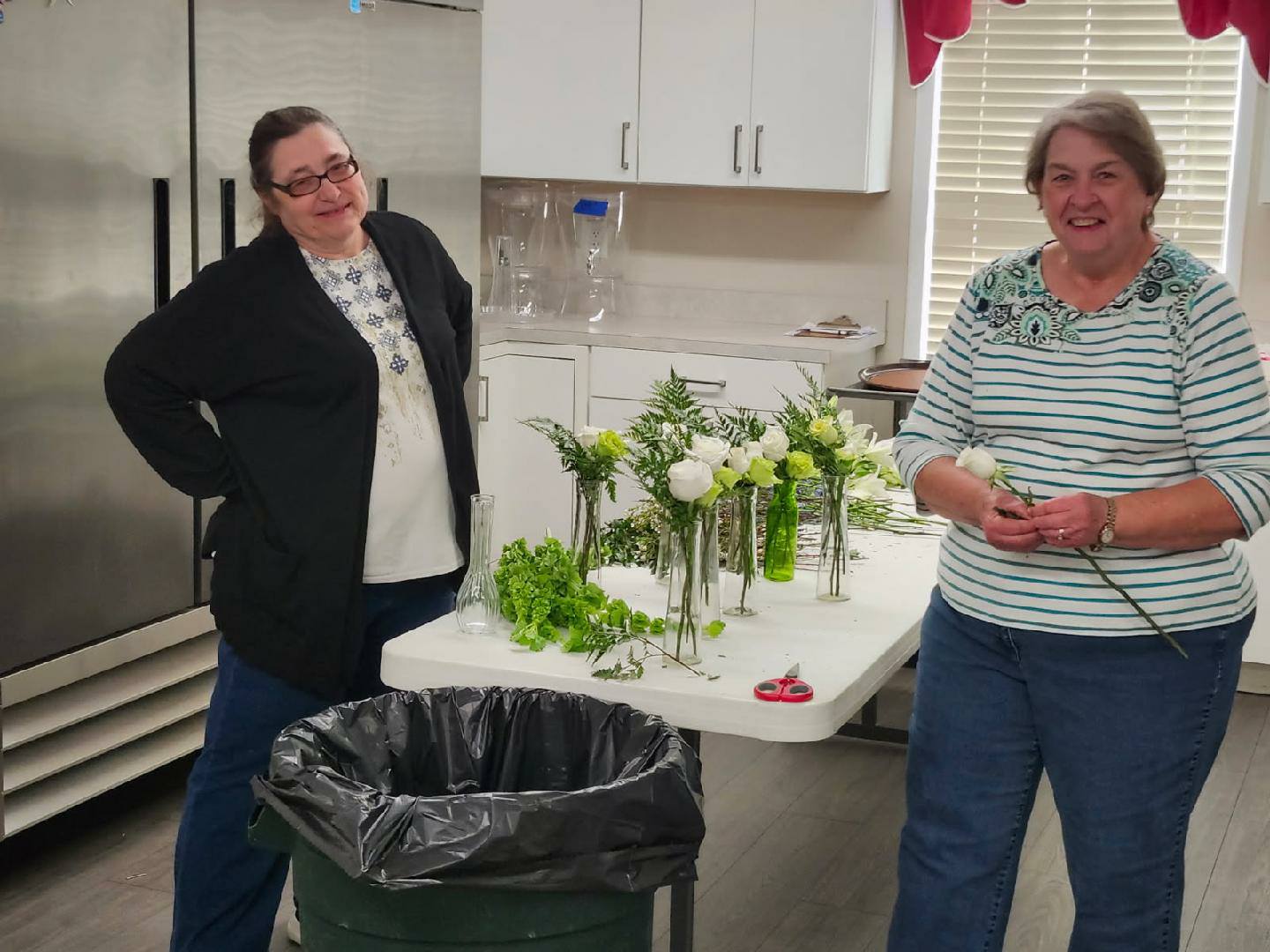 Ladies with flower arrangement