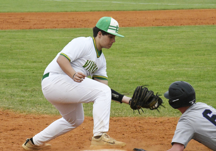 West Bladen's #6 returns safely to third.