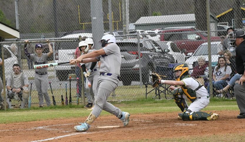 West Bladen's #18 flies out to left
