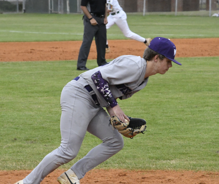 West Bladen's third  baseman fields a grounder