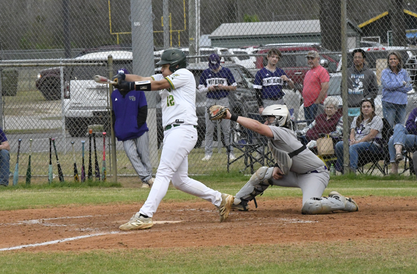 West Bladen's #12 watches a low one