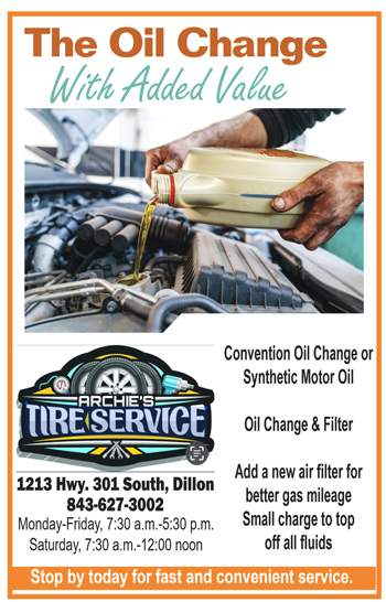 Person pouring motor oil into a car engine, advertisement for Pache Tire Service offering oil changes and filters, located at 1213 Hwy. 301 South, Dillon.