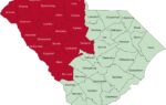 A map of South Carolina with counties under a Red Flag Fire Alert shaded in red, western region highlighted, other counties in green.