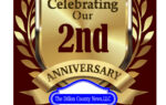 Golden shield with laurel wreath, reads "Celebrating Our 2nd Anniversary." Below, thanks to readers and advertisers from The Inba County News, LLC.