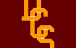 Yellow interlocking letters "DCS" on a maroon background.