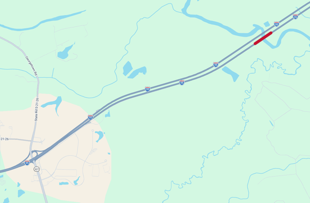 Map showing a section of Interstate 95 with a highlighted red segment indicating traffic congestion or a closed road east of a highway interchange.