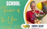 Woman holding flowers, balloon, and bouquet, smiling. Text: "Latta Middle School Teacher of the Year 2026-2027. Cheryl Selby." School mascot Viking logo displayed.