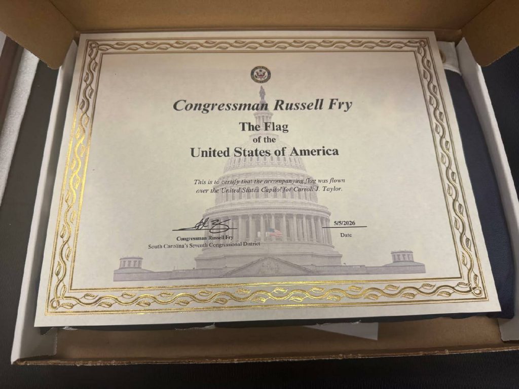 A certificate from Congressman Russell Fry for a U.S. flag flown over the Capitol, dated 5/5/2026, with a gold decorative border and an image of the Capitol.