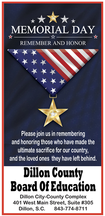 Memorial Day poster with American flag medal, gold star, and message honoring those who sacrificed for the country. Dillon County Board of Education contact information at bottom.