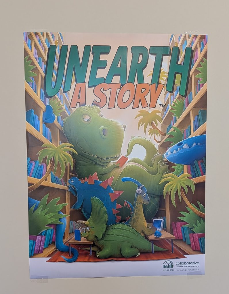 Dinosaurs reading books and using laptops in a colorful library with the words "Unearth A Story" above them.