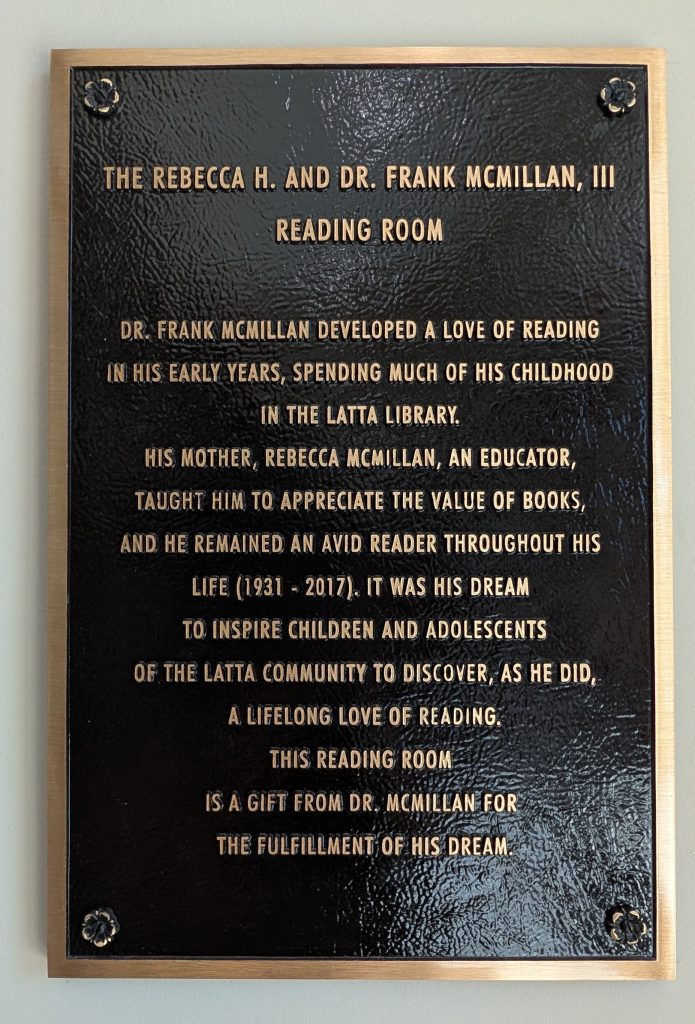 Plaque dedicating the Rebecca H. and Dr. Frank McMillan, III Reading Room, honoring a lifelong love of reading and inspiring community children and adolescents.