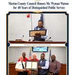 Marion County Council presents an award to Mr. Wyran Watson for 40 years of public service; group photo with framed certificates.