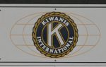 Kiwanis International logo featuring a large "K" in the center, surrounded by a circular border with text and decorative elements.