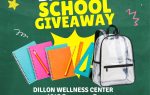 Back to school giveaway flyer with backpack, notebooks, and school supplies; event at Dillon Wellness Center, July 11, 2026, offering free clear backpacks and more.